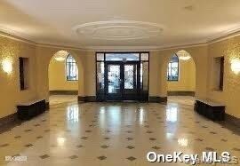 Lobby featuring crown molding