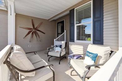 View of patio with a porch and ceiling fan