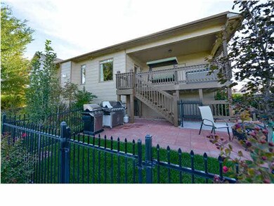 A portion of the backyard is fenced for your kids,