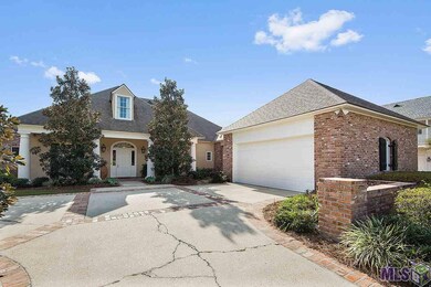Double garage with extra parking pad for guest.