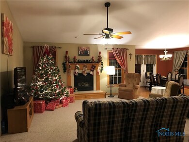 Spacious family room with fireplace.
