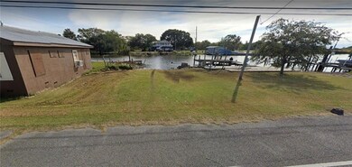 Lot across the street on Bayou also included