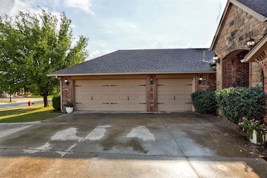 Garage with concrete driveway