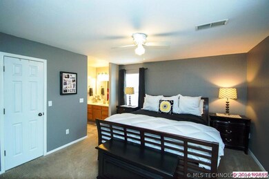 Designer colors showcase the master bedroom
