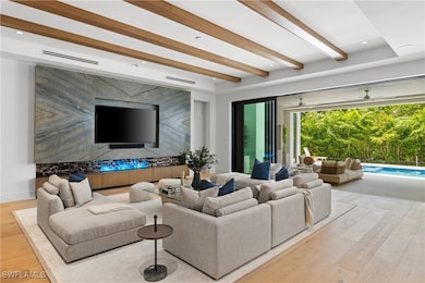 The showpiece great room is anchored by an Ocean B