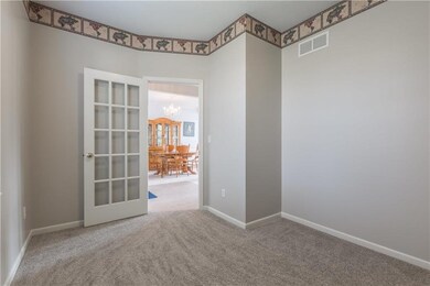 Den/Study, with new carpet, on main level.