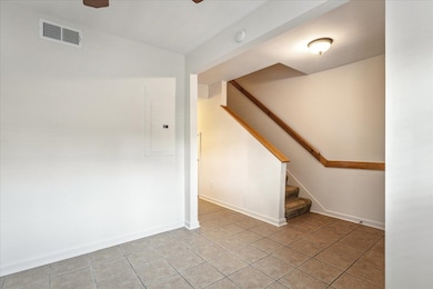 Dining room could easily be converted to office sp