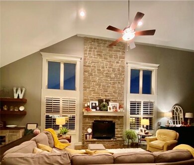 A full shot of the floor-to-ceiling fireplace and 