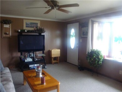 Living Room. Beautiful bow window lets plenty of s