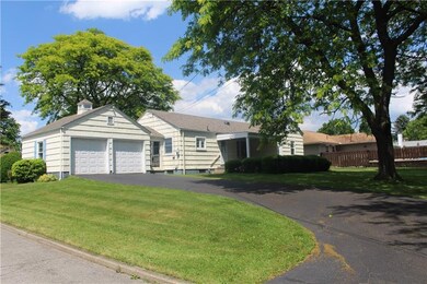 Two car attached garage with generous room for off