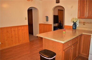 The arched doors and wainscoting add great detail