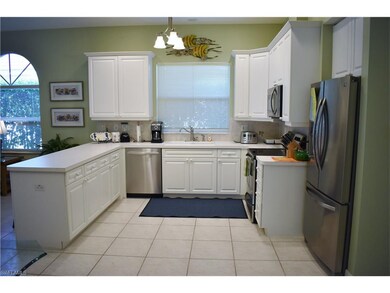 Newer Stainless Steel appliances and tile floor