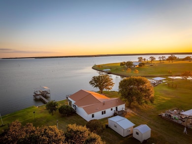 Aerial view at dusk with a water view