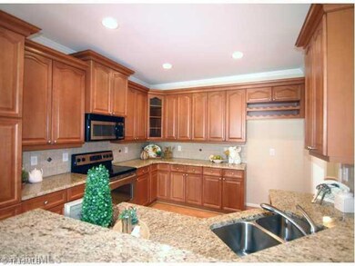 Kitchen. Kitchen with all the upgrades - granite, tile backspash, stainless appliances...