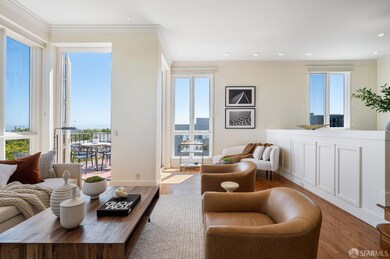 The elegant sunken living room enjoys floor-to-cei