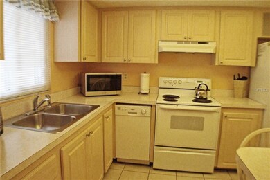 Kitchen - wood cabinets, mini-dishwasher, double s