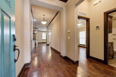 Corridor featuring a healthy amount of sunlight an