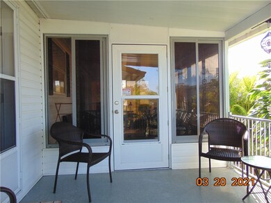 Entry to fully enclosed sunroom.