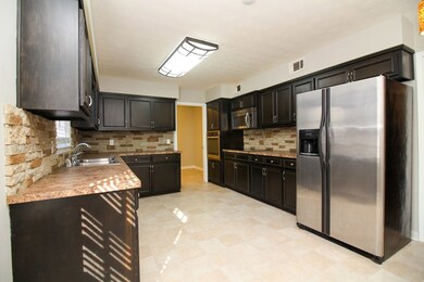 Spacious kitchen with eat in area