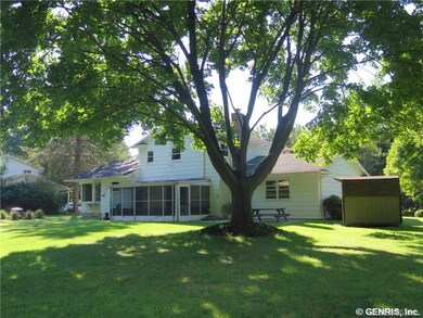 Backyard. Very large backyard with screen porch!
