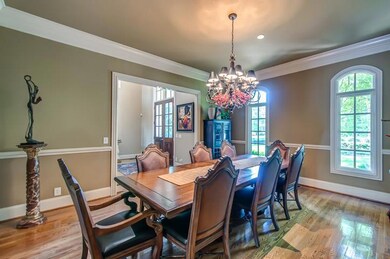 Large formal dining room will accommodate large furniture.