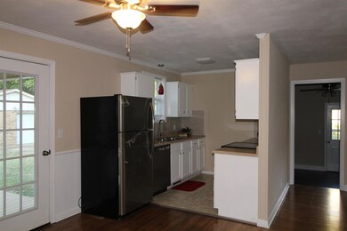 Cute kitchen with all new appliances. Tile flooring and back-splash.