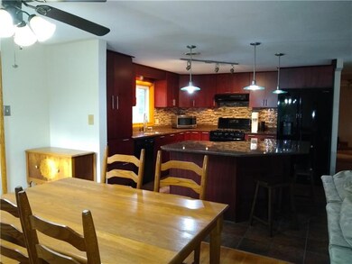 The dining room is perfectly adjacent from the kitchen masterpiece