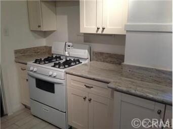 Updated kitchen with granite counter tops