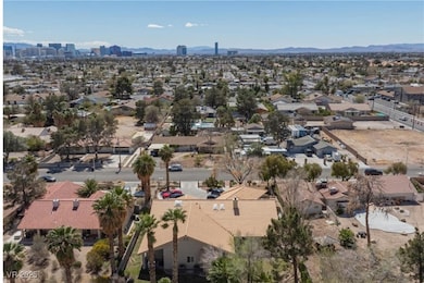 Aerial view of residential area with a mountain backdrop