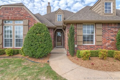 Full brick home with landscaping, gutters, storm d