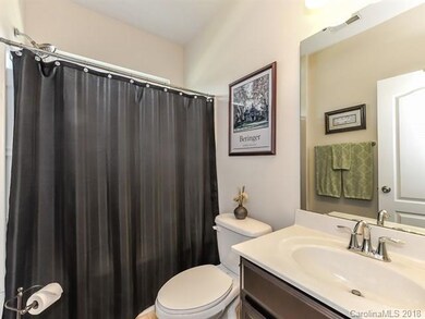 Spacious guest full bath with tub/shower.