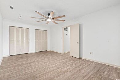 Unfurnished bedroom with light wood-type flooring,
