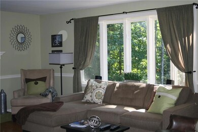 Living room with bay window,...