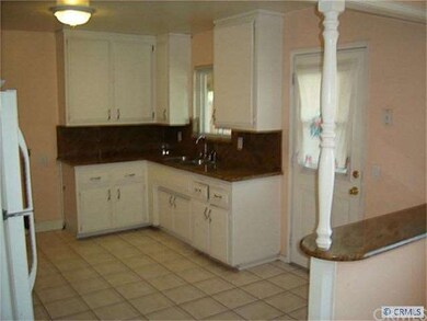Kitchen with granite countertops.