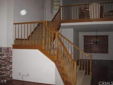 Stairway & loft/bonus room above, and downstairs d