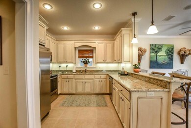 Tea stained cabinets in kitchen