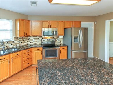 Plenty of counter space with ample cabinets and pa
