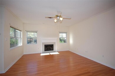 Family Room as laminate wood flooring.