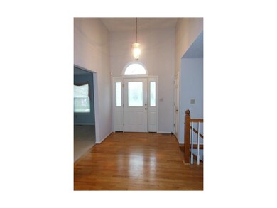 Entry with beautiful hardwoods.