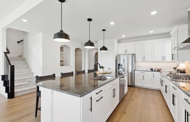 Gourmet kitchen designed for culinary excellence and entertaining *Model representation
