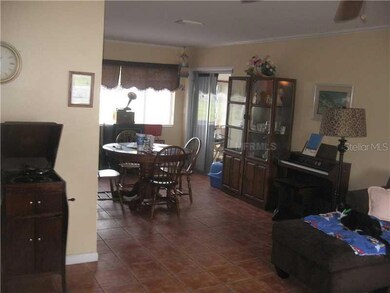Dining Room - The kitchen is open to the left of the dining table.