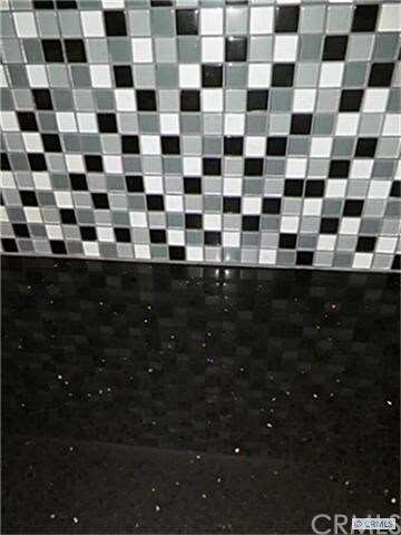 Black & White Mosaic Glass Tile with Granite Count