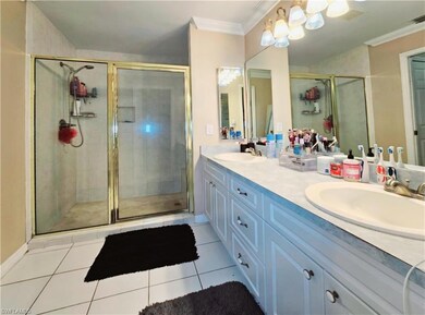 Master Bathroom with tile patterned floors, vanity