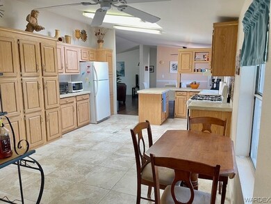 View from laundry room into small dining area lead