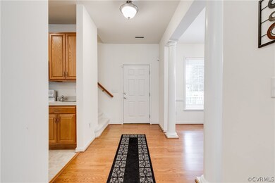 Entryway with Light Wood-Type Flooring and Orante