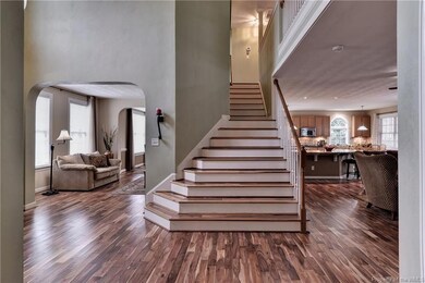 Beautiful Acacia Flooring Troughout Lower Level