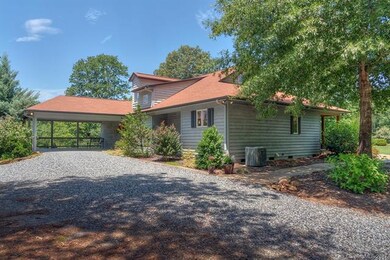Spacious carport and lots of parking areas.