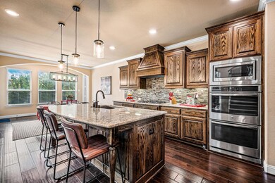 Double ovens, Granite Countertops, Custom Cabinets