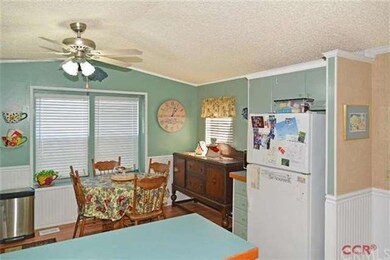 Note windows on two sides of kitchen