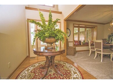 The two story, foyer entry features hardwood floor
